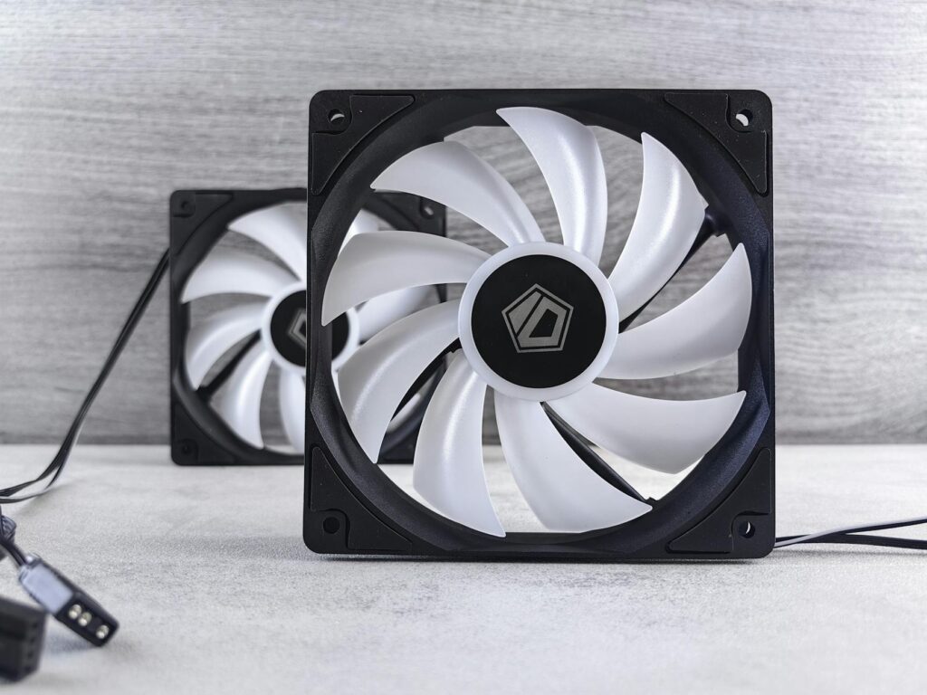 pexels-photo-27966309-27966309 Square computer cooling fans with white blades on a gray background.